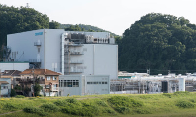 写真：サントリー⾷品インターナショナル株式会社 多摩川⼯場
        の外観